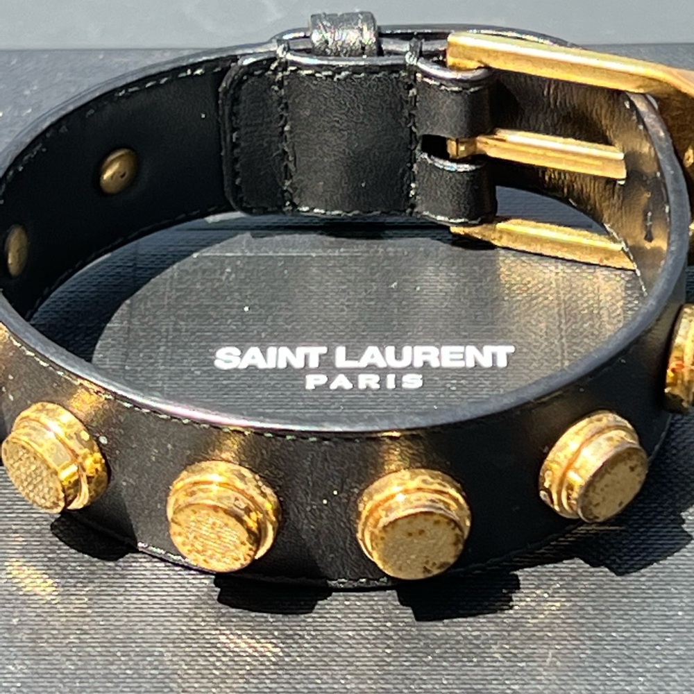 Saint Laurent gold studded bracelet.